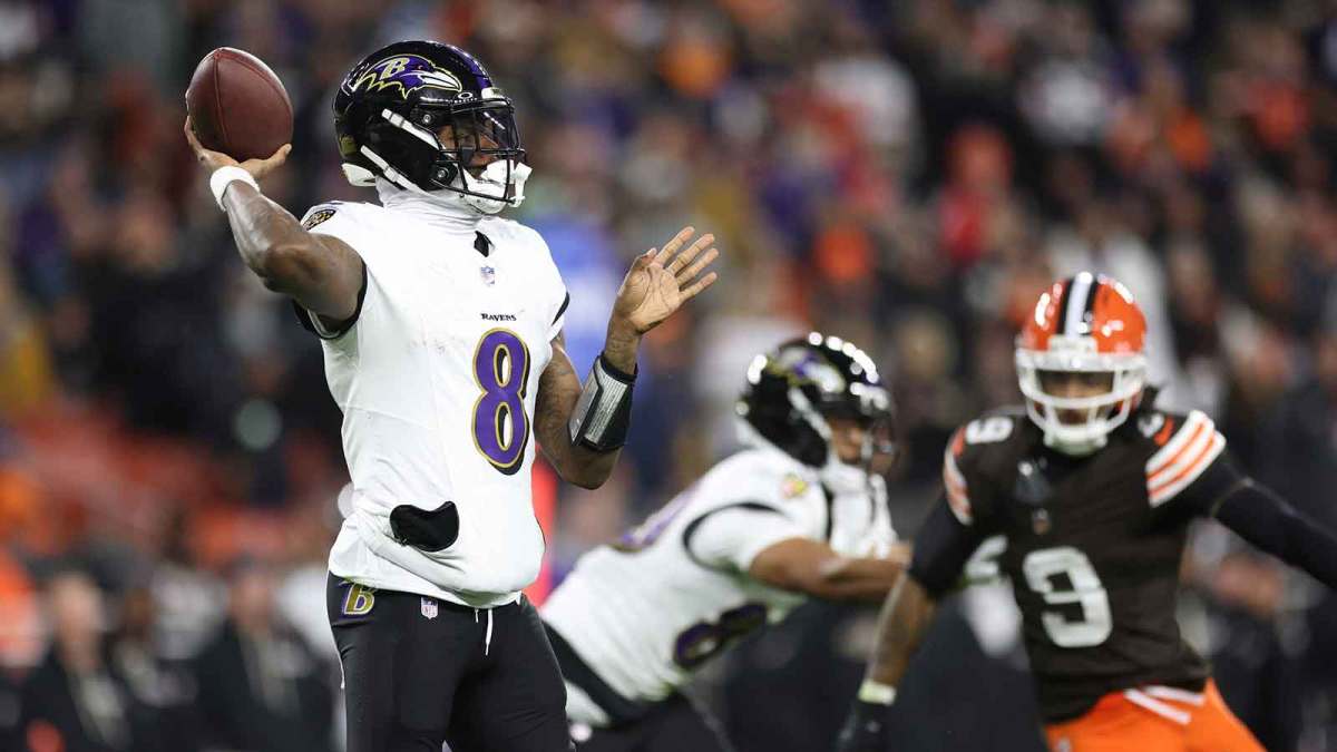 Baltimore Ravens quarterback Lamar Jackson (8) throws downfield during the second quarter against the Cleveland Browns at Huntington Bank Field.