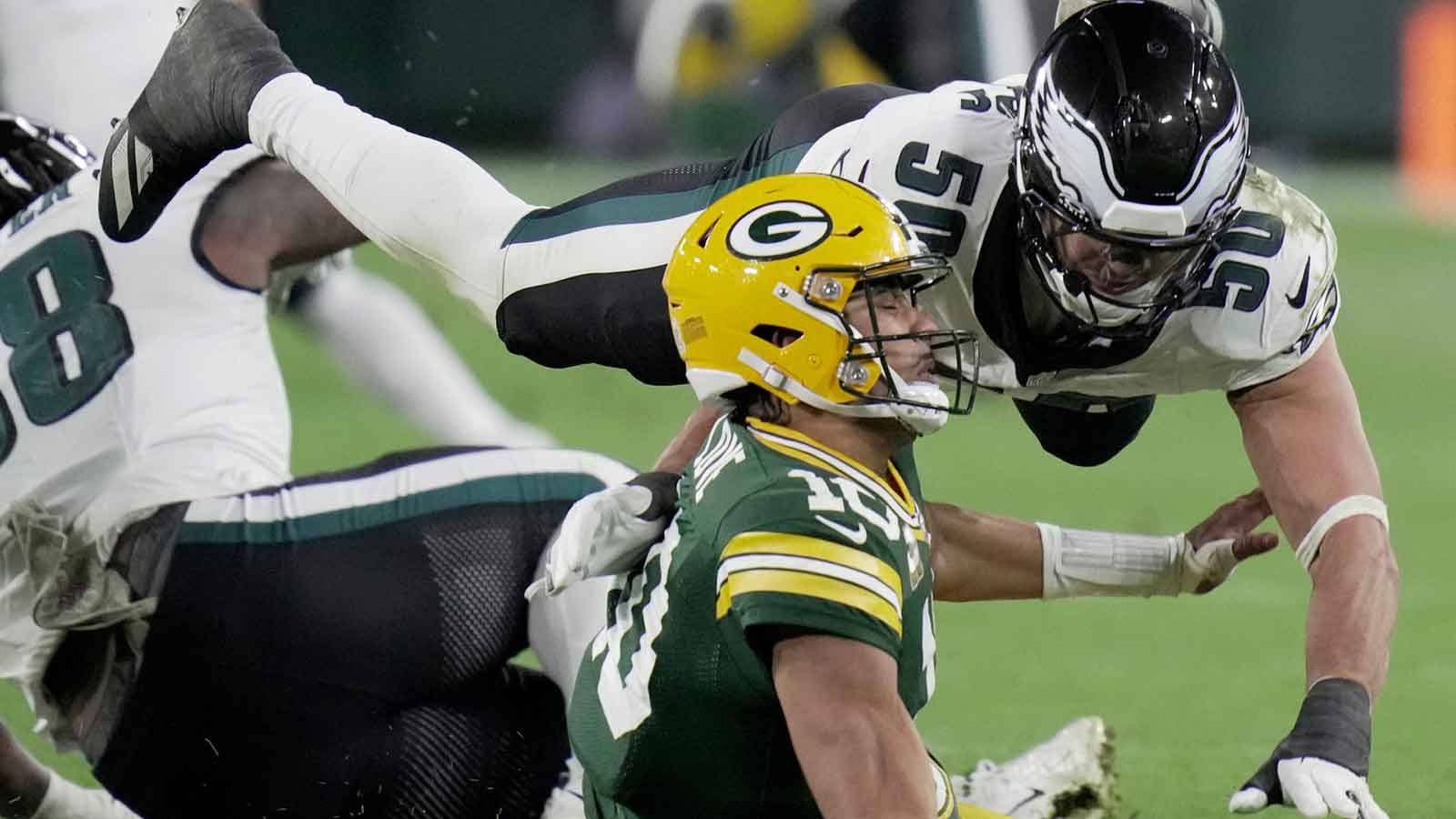 Philadelphia Eagles linebacker Jaelan Phillips (50) pressures Green Bay Packers quarterback Jordan Love (10) during the fourth quarter of their game Monday, November 10, 2025 at Lambeau Field in Green Bay, Wisconsin.