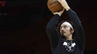 Miami Heat forward Jaime Jaquez Jr. (11) warms up against the Cleveland Cavaliers at Kaseya Center.