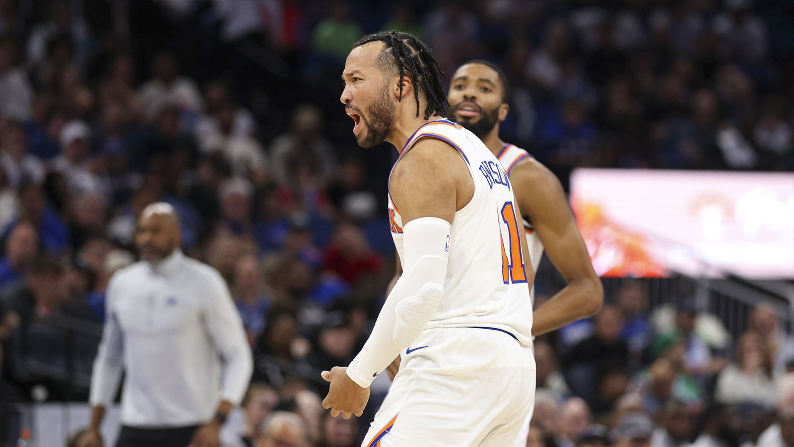 New York Knicks guard Jalen Brunson (11) reacts after a basket against the Orlando Magic in the second quarter at Kia Center.