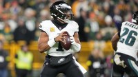 Philadelphia Eagles quarterback Jalen Hurts (1) stands in the pocket against the Green Bay Packers in the first half at Lambeau Field.