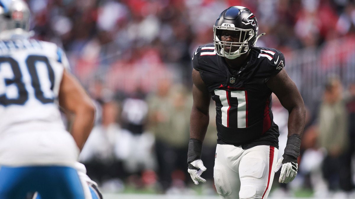 Atlanta Falcons edge Jalon Walker (11) prepares for the start of a play in the fourth quarter against the Carolina Panthers at Mercedes-Benz Stadium.