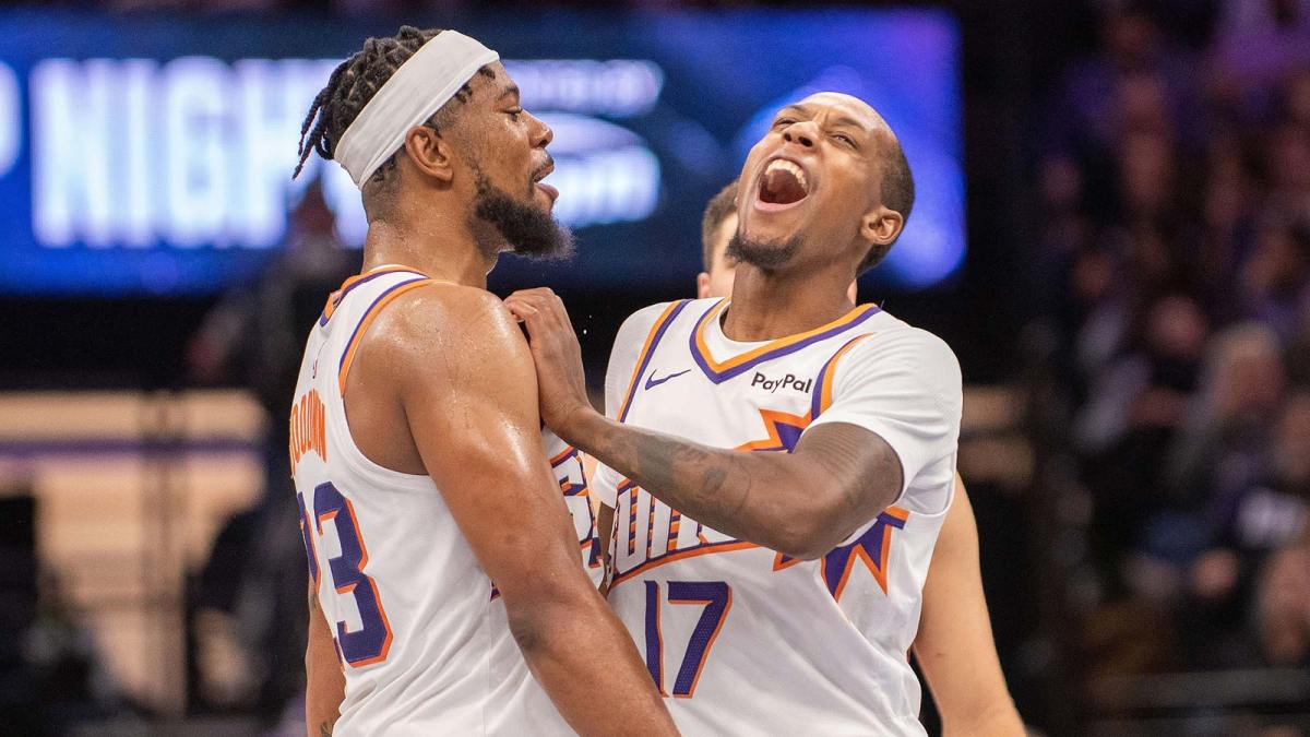 Phoenix Suns guard Jamaree Bouyea (17) celebrates with guard Jordan Goodwin (23) after making a three point shot during the fourth quarter of the game against the Sacramento Kings at Golden 1 Center.