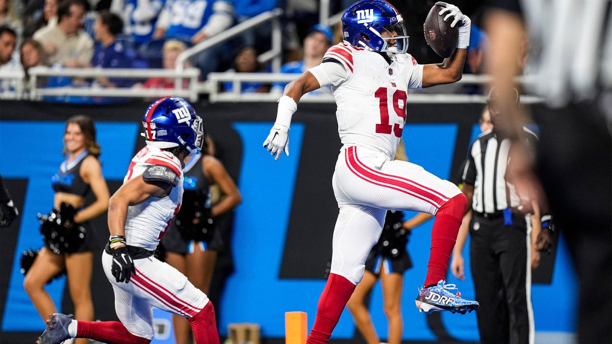 New York Giants Jameis Winston scoring a touchdown on a trick play against the Detroit Lions.