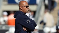 Penn State Nittany Lions head coach James Franklin stands on the field during a warmup prior to the game against the Northwestern Wildcats at Beaver Stadium.