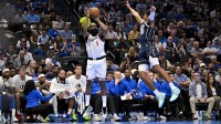 LA Clippers guard James Harden (1) makes a three point basket over Dallas Mavericks guard Max Christie (00) during the second quarter in an NBA Cup game at the American Airlines Center.