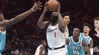 Los Angeles Clippers guard James Harden (1) drives in during the second half against the Charlotte Hornets at the Spectrum Center.