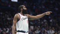 Los Angeles Clippers guard James Harden (1) signals to his teammates during the second half against the Charlotte Hornets at the Spectrum Center.