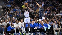 LA Clippers guard James Harden (1) makes a three point basket over Dallas Mavericks guard Max Christie (00) during the second quarter in an NBA Cup game at the American Airlines Center.