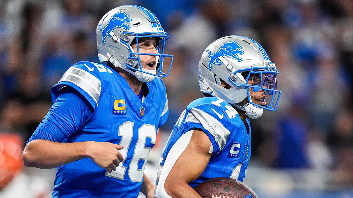 Detroit Lions wide receiver Amon-Ra St. Brown (14) celebrates a touchdown against Cleveland Browns with quarterback Jared Goff (16) during the second half at Ford Field in Detroit on Sunday, Sept. 28, 2025.