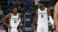 Memphis Grizzlies forward/center Jaren Jackson Jr. (8) talks with guard Ja Morant (12) during the second quarter against the Houston Rockets at FedExForum.