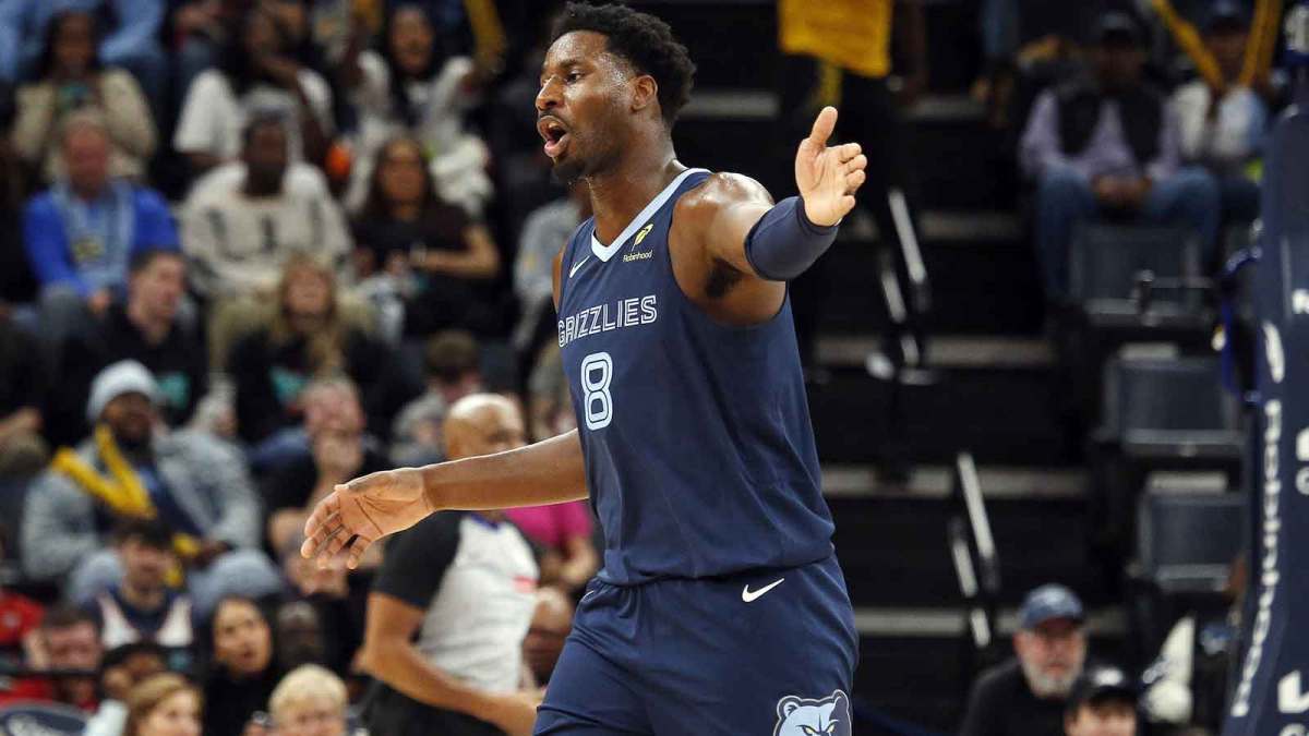 Memphis Grizzlies forward/center Jaren Jackson Jr. (8) reacts during the third quarter against the Detroit Pistons at FedExForum.