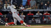 Boston Red Sox outfielder Jarren Duran (16) breaks his bat as he lines out during the first inning against the New York Yankees during game three of the Wildcard round for the 2025 MLB playoffs at Yankee Stadium.