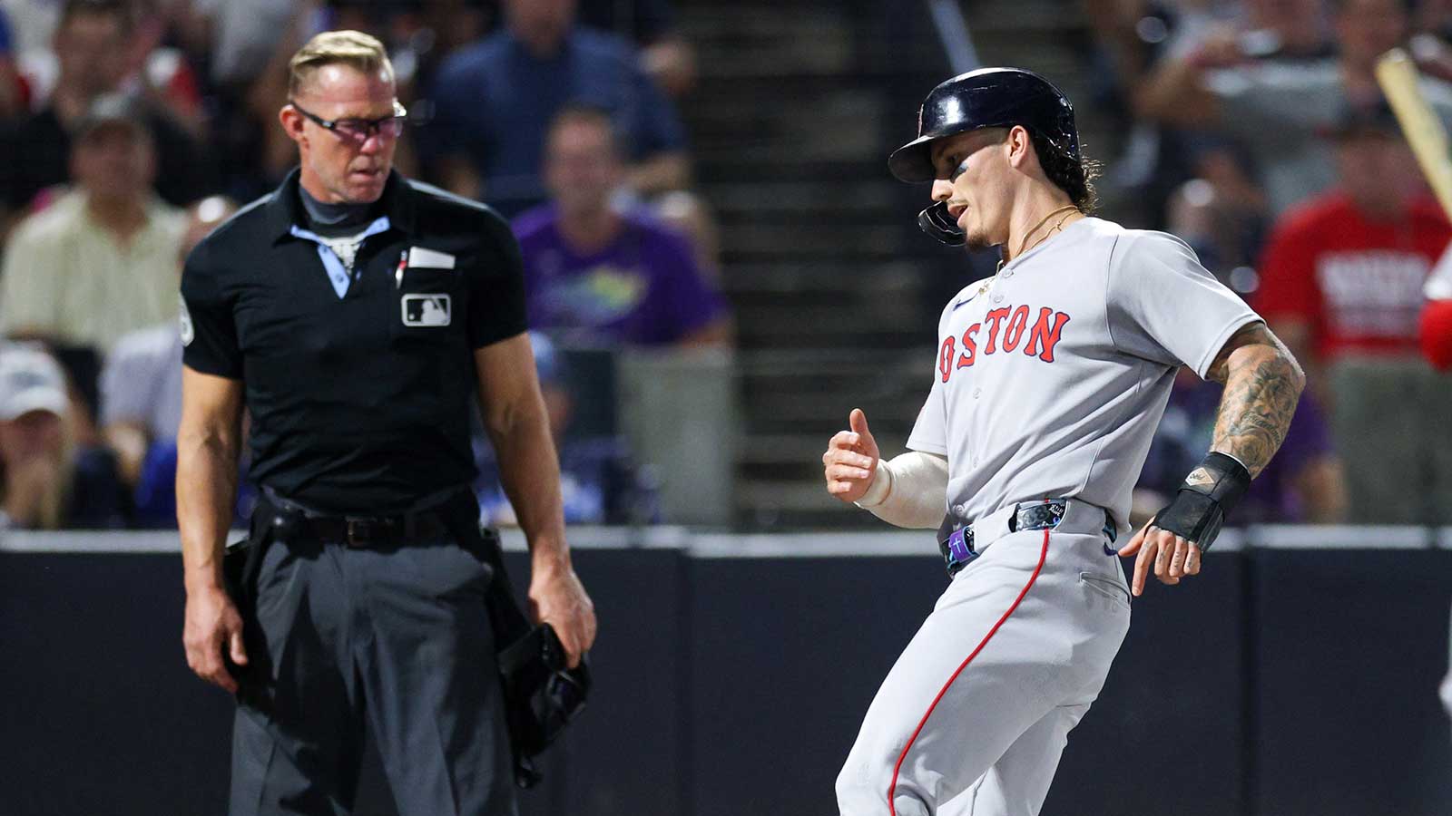 Boston Red Sox left fielder Jarren Duran (16) scores a run against the Boston Red Sox in the third inning at George M. Steinbrenner Field.