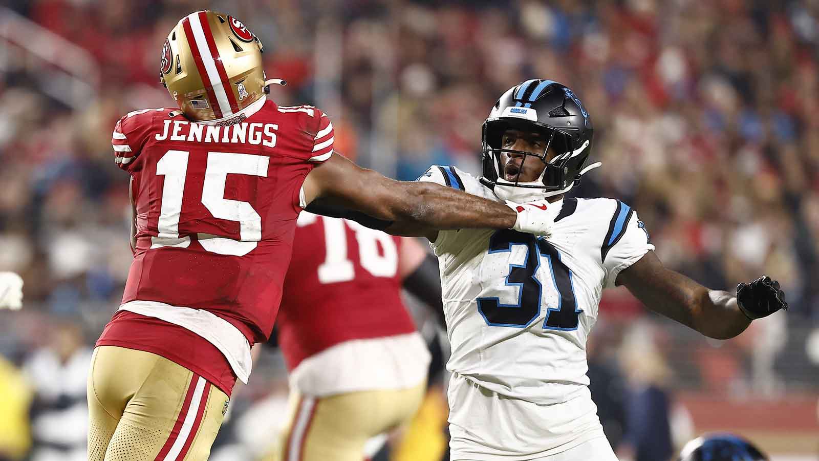 San Francisco 49ers wide receiver Jauan Jennings (15) and Carolina Panthers cornerback Corey Thornton (31) shove each other during the second half at Levi's Stadium.