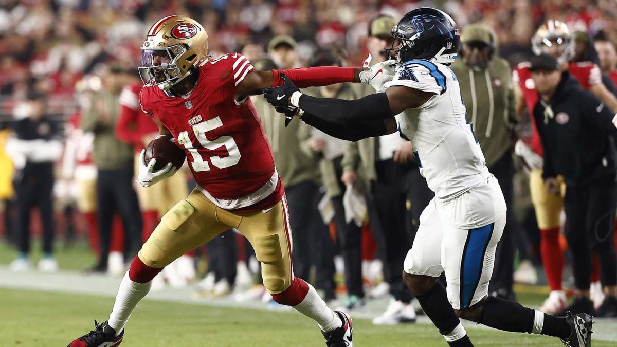 San Francisco 49ers wide receiver Jauan Jennings (15) and Carolina Panthers cornerback Corey Thornton (31) shove each other during the second half at Levi's Stadium.