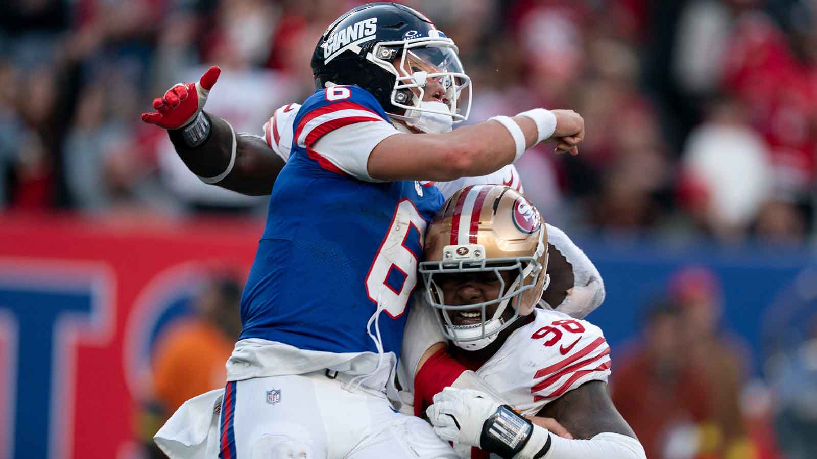 New York Giants quarterback Jaxson Dart (6) throws the ball away to avoid a sack during a week 9 game between New York Giants and San Francisco 49ers at MetLife Stadium on Sunday, Nov. 2, 2025.