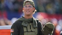 New York Giants quarterback Jaxson Dart (6) looks on before the game against the Green Bay Packers at MetLife Stadium.