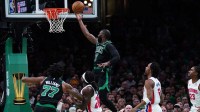 Boston Celtics guard Jaylen Brown (7) drives to the basket against the Detroit Pistons in the first quarter at TD Garden.
