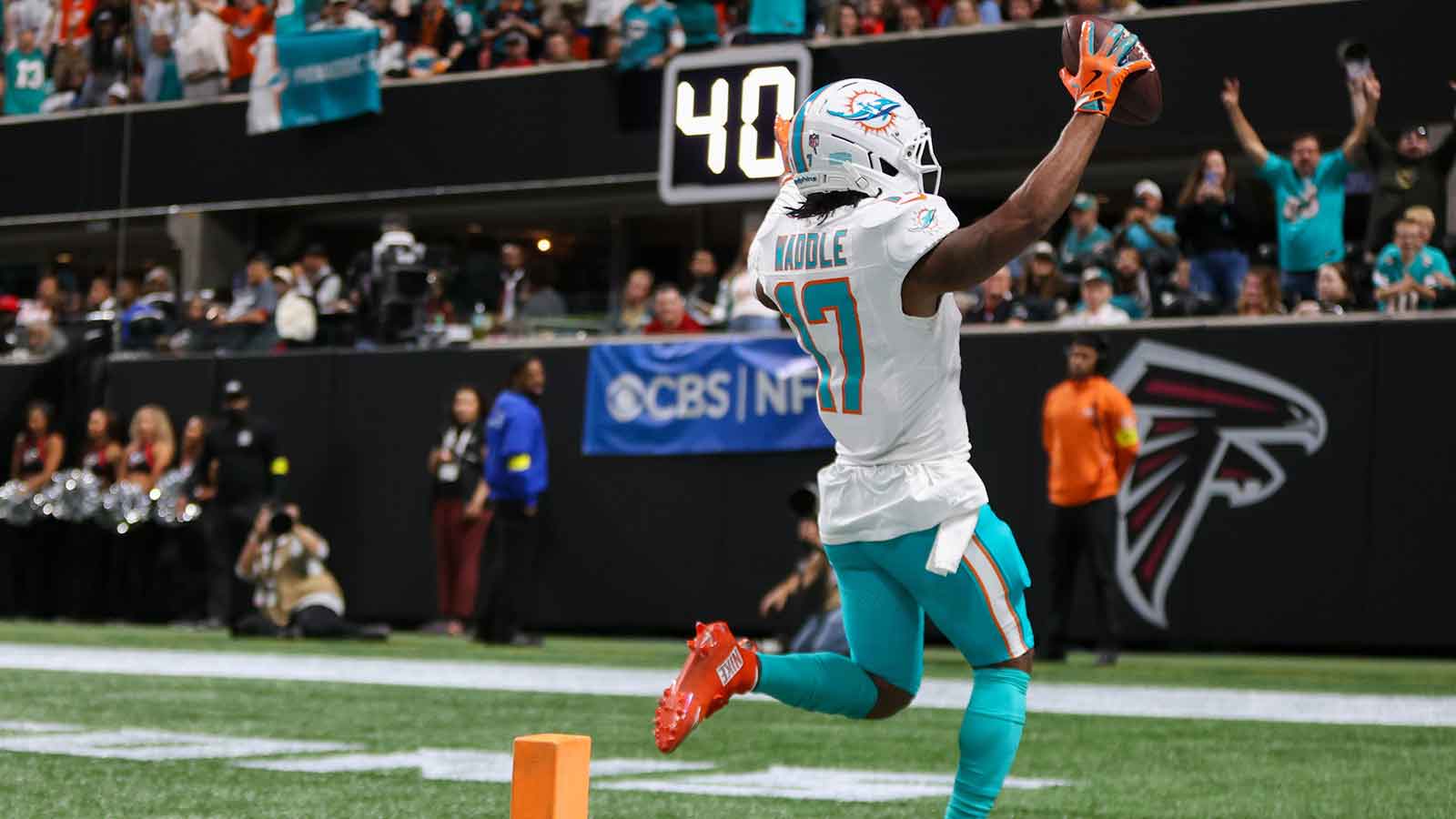 Miami Dolphins wide receiver Jaylen Waddle (17) scores a touchdown against the Atlanta Falcons in the third quarter at Mercedes-Benz Stadium.