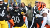 Pittsburgh Steelers running back Jaylen Warren (30) runs with the ball against the Cincinnati Bengals during the first half against at Acrisure Stadium.