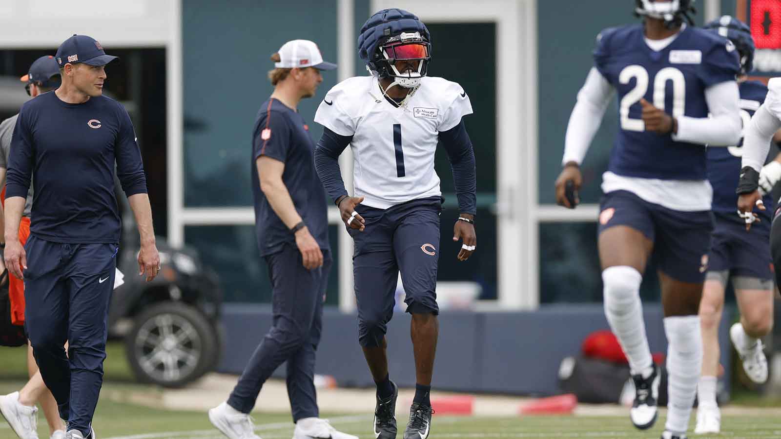 Chicago Bears quarterback Caleb Williams (18) greets a Minnesota Vikings player following a game at U.S. Bank Stadium.