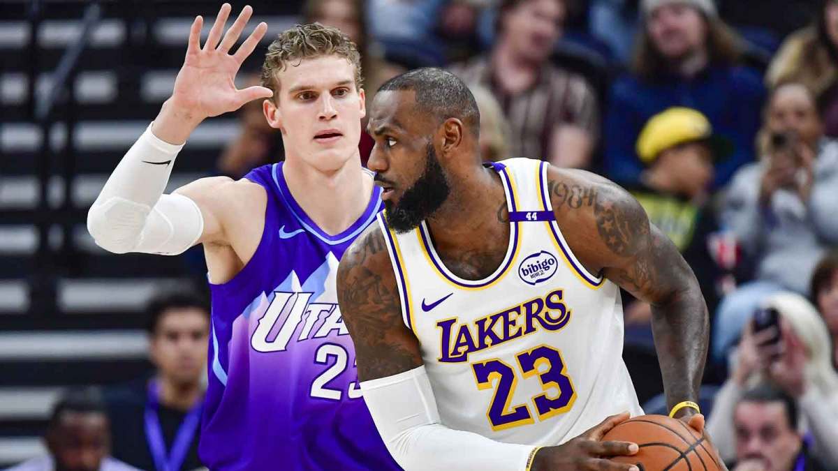 Utah Jazz forward/center Lauri Markkanen (23) defends Los Angeles Lakers forward LeBron James (23) during the first half at the Delta Center.