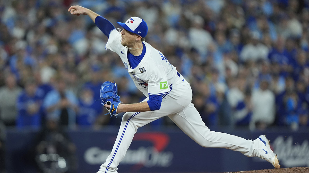 Toronto Blue Jays pitcher Jeff Hoffman (23) pitches against the Los Angeles Dodgers in the ninth inning during game seven of the 2025 MLB World Series at Rogers Centre.