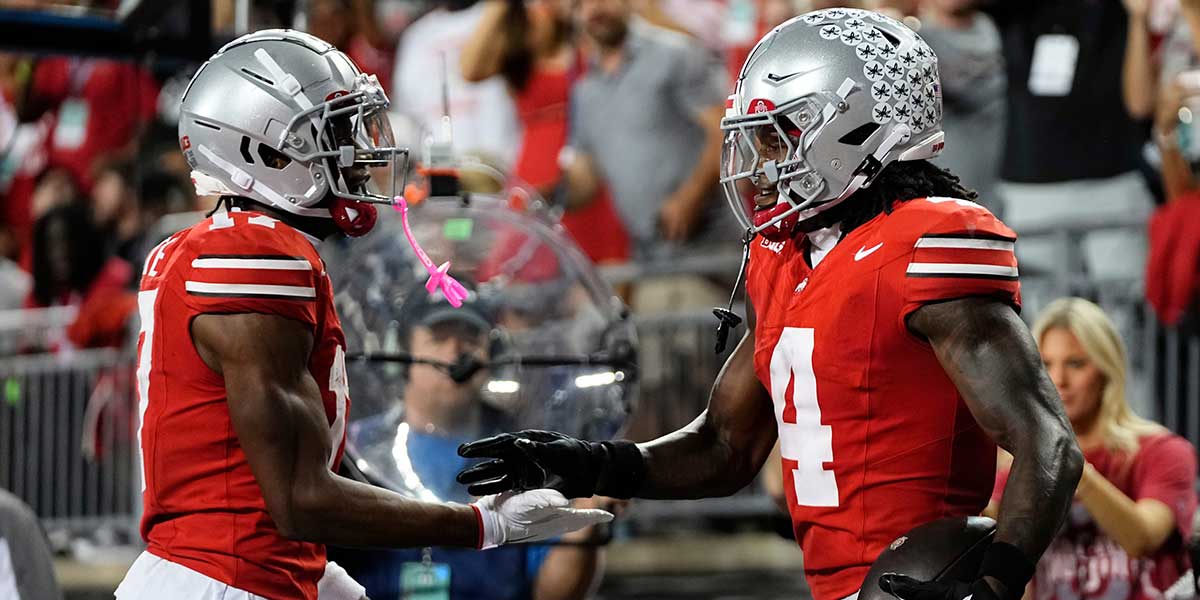 Ohio State Buckeyes wide receiver Carnell Tate (17) celebrates a touchdown by wide receiver Jeremiah Smith (4) during the first half of the NCAA football game against the Minnesota Golden Gophers at Ohio Stadium in Columbus on Oct. 4, 2025.