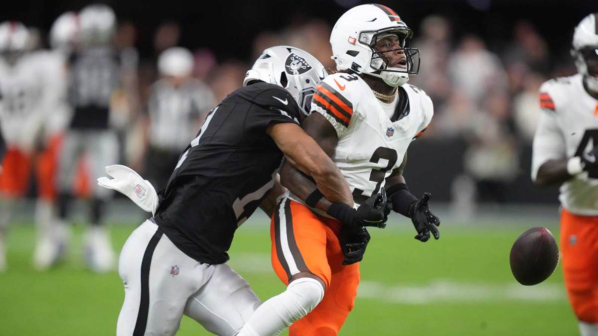 Las Vegas Raiders safety Jeremy Chinn (11) tackles Cleveland Browns wide receiver Jerry Jeudy (3) in the first half at Allegiant Stadium.