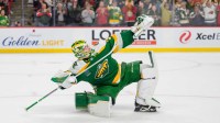 Minnesota Wild goaltender Jesper Wallstedt (30) celebrates after making the game winning save against Carolina Hurricanes left wing Taylor Hall (71) in the overtime shootout at Grand Casino Arena.