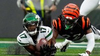 New York Jets wide receiver Garrett Wilson (17) dives under the ball for a catch in the fourth quarter of the NFL Week 3 game between the New York Jets and the Cincinnati Bengals at MetLife Stadium in East Rutherford, N.J., on Sunday, Sept. 25, 2022