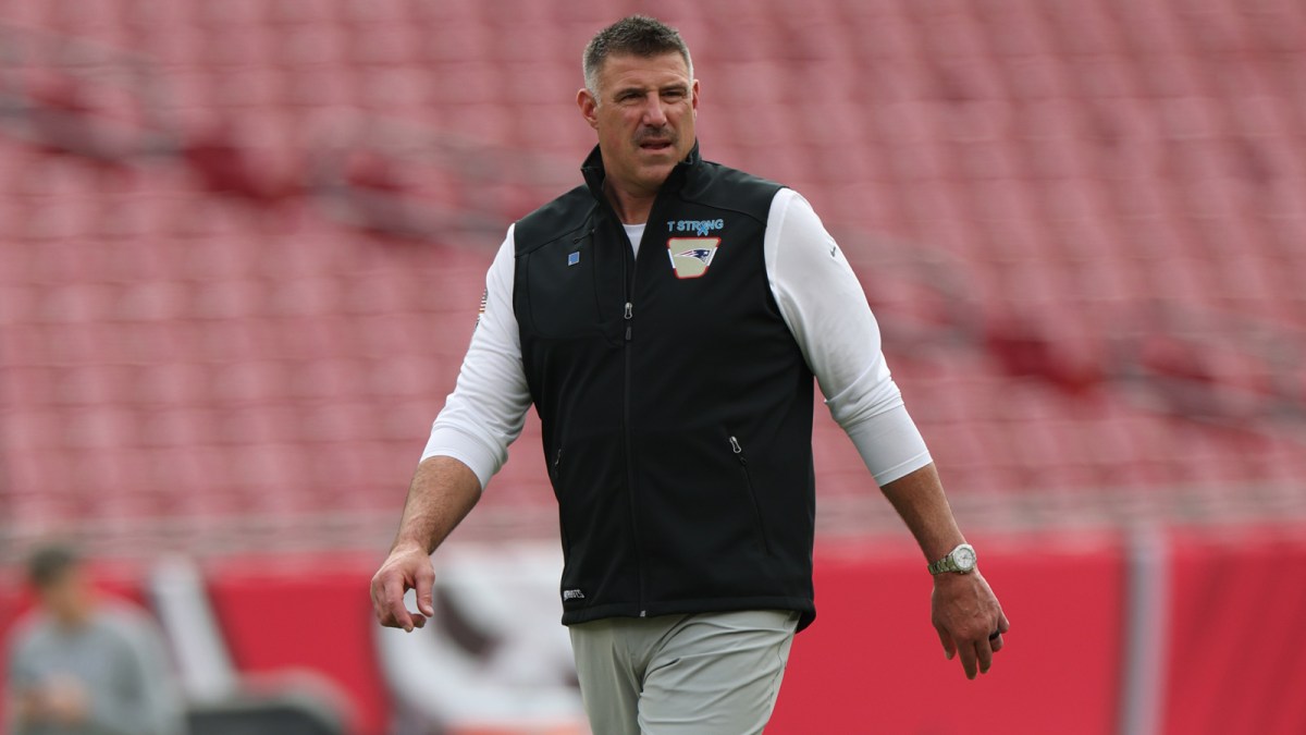 New England Patriots head coach Mike Vrabel walks the field prior to a game against the Tampa Bay Buccaneers at Raymond James Stadium.