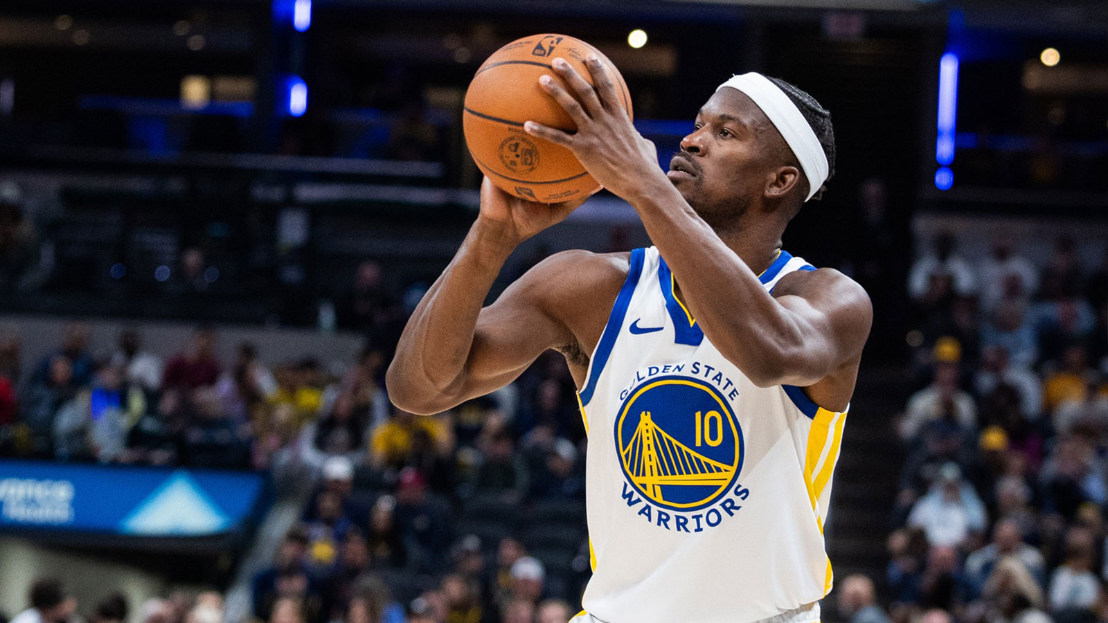 Golden State Warriors forward Jimmy Butler III (10) shoots the ball in the first half against the Indiana Pacers at Gainbridge Fieldhouse.