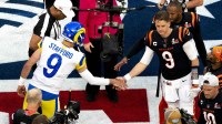 Los Angeles Rams quarterback Matthew Stafford (9) shakes the hand of Cincinnati Bengals quarterback Joe Burrow (9) after Cincinnati Bengals won the coin toss during Super Bowl 56, Sunday, Feb. 13, 2022, at SoFi Stadium in Inglewood, Calif. Los Angeles Rams defeated Cincinnati Bengals 23-20.