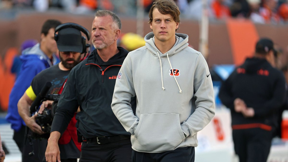 Cincinnati Bengals quarterback Joe Burrow (9) looks on on the sidelines during the second quarter against the New York Jets at Paycor Stadium.