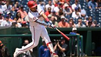 Washington Nationals first baseman Joey Meneses (45) hits the ball into play against the New York Mets during the fourth inning at Nationals Park.
