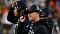 Baltimore Ravens head coach John Harbaugh stands on the sidelines during the second quarter against the Cleveland Browns at Huntington Bank Field.