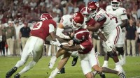 Alabama Crimson Tide defensive back Zabien Brown (2) and defensive back Keon Sabb (3) combine to tackle Oklahoma Sooners quarterback John Mateer (10) at Saban Field at Bryant-Denny Stadium. Oklahoma defeated Alabama 23-21.