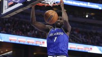 Magic forward Jonathan Isaac (1) dunks