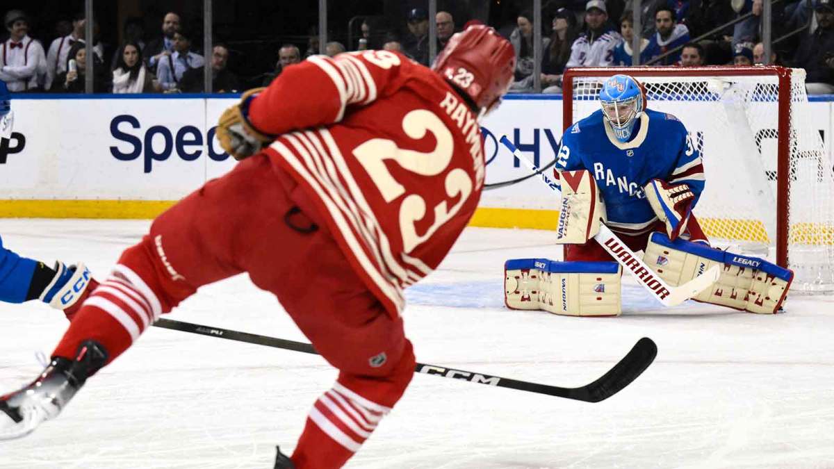 New York Rangers goaltender Jonathan Quick (32) makes a save against Detroit Red Wings left wing Lucas Raymond (23) during the second period at Madison Square Garden.