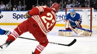 New York Rangers goaltender Jonathan Quick (32) makes a save against Detroit Red Wings left wing Lucas Raymond (23) during the second period at Madison Square Garden.
