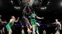 Brooklyn Nets center Day'Ron Sharpe (20) dunks against Boston Celtics center Neemias Queta (88) during the fourth quarter at Barclays Center.
