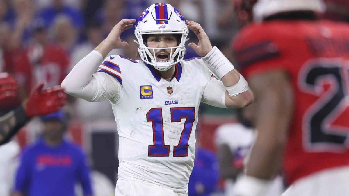 Buffalo Bills quarterback Josh Allen (17) signals at the line of scrimmage during the second half against the Houston Texans at NRG Stadium.