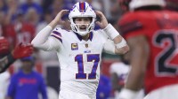 Buffalo Bills quarterback Josh Allen (17) signals at the line of scrimmage during the second half against the Houston Texans at NRG Stadium.