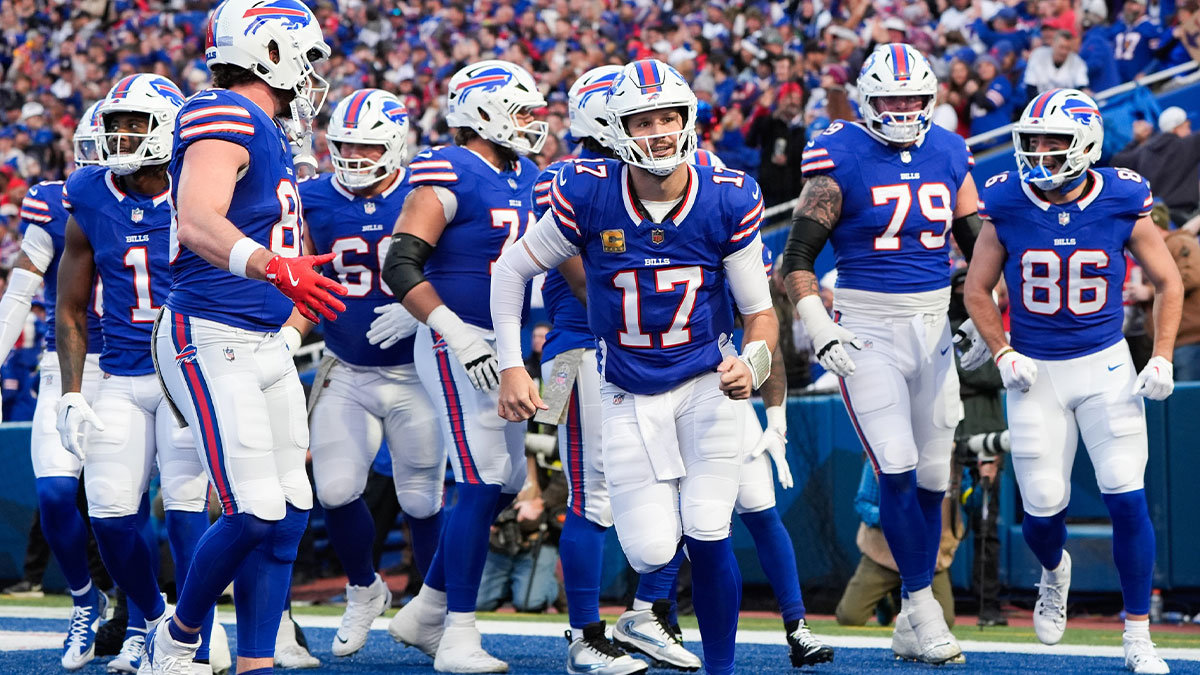 Buffalo Bills quarterback Josh Allen (17) celebrates a touchdown scored by tight end Dalton Kincaid (86) in the first quarter against the Kansas City Chiefs at Highmark Stadium.