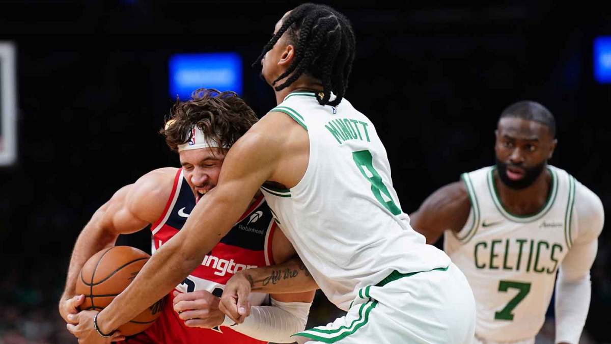 Boston Celtics forward Josh Minott (8) defends against Washington Wizards forward Corey Kispert (24) in the second quarter at TD Garden.