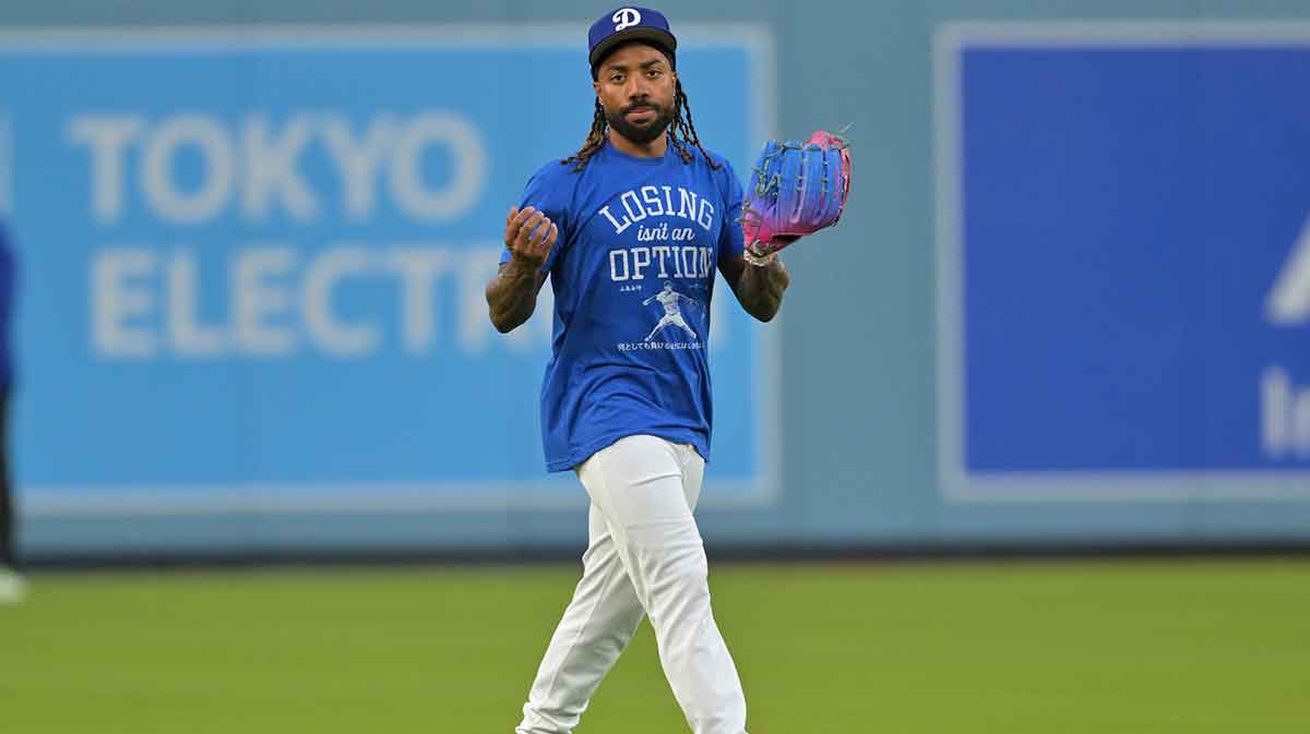 Los Angeles Dodgers center fielder Justin Dean (75) takes ground balls during World Series workouts prior to game three against the Toronto Blue Jays at Dodger Stadium.