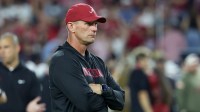 Alabama Crimson Tide head coach Kalen Deboer looks on during warmups prior to the game against the Louisiana State Tigers at Saban Field at Bryant-Denny Stadium.