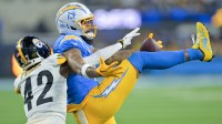 Pittsburgh Steelers cornerback James Pierre (42) breaks up a pass intended for Los Angeles Chargers wide receiver Keenan Allen (13) during the second quarter of the game at SoFi Stadium.
